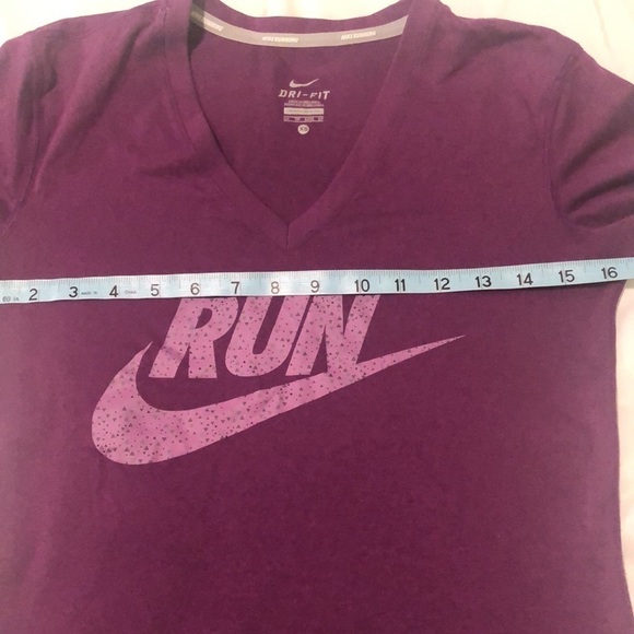 Nike running Dri-Fit T-shirt short sleeve in purple with Run saying and swoosh - Picture 5 of 7